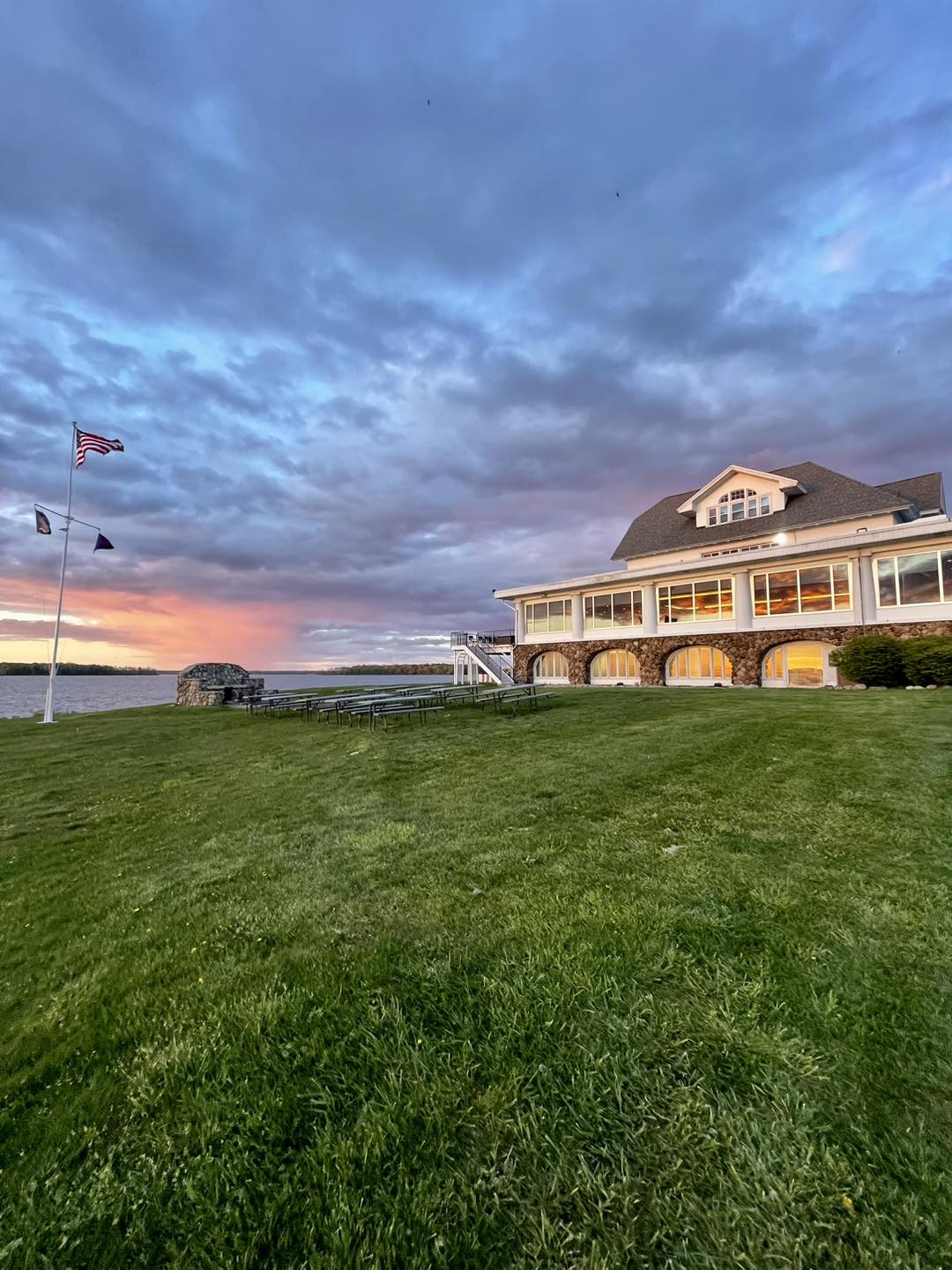 Lake Shore Yacht & Country Club clubhouse at sunset on Oneida Lake